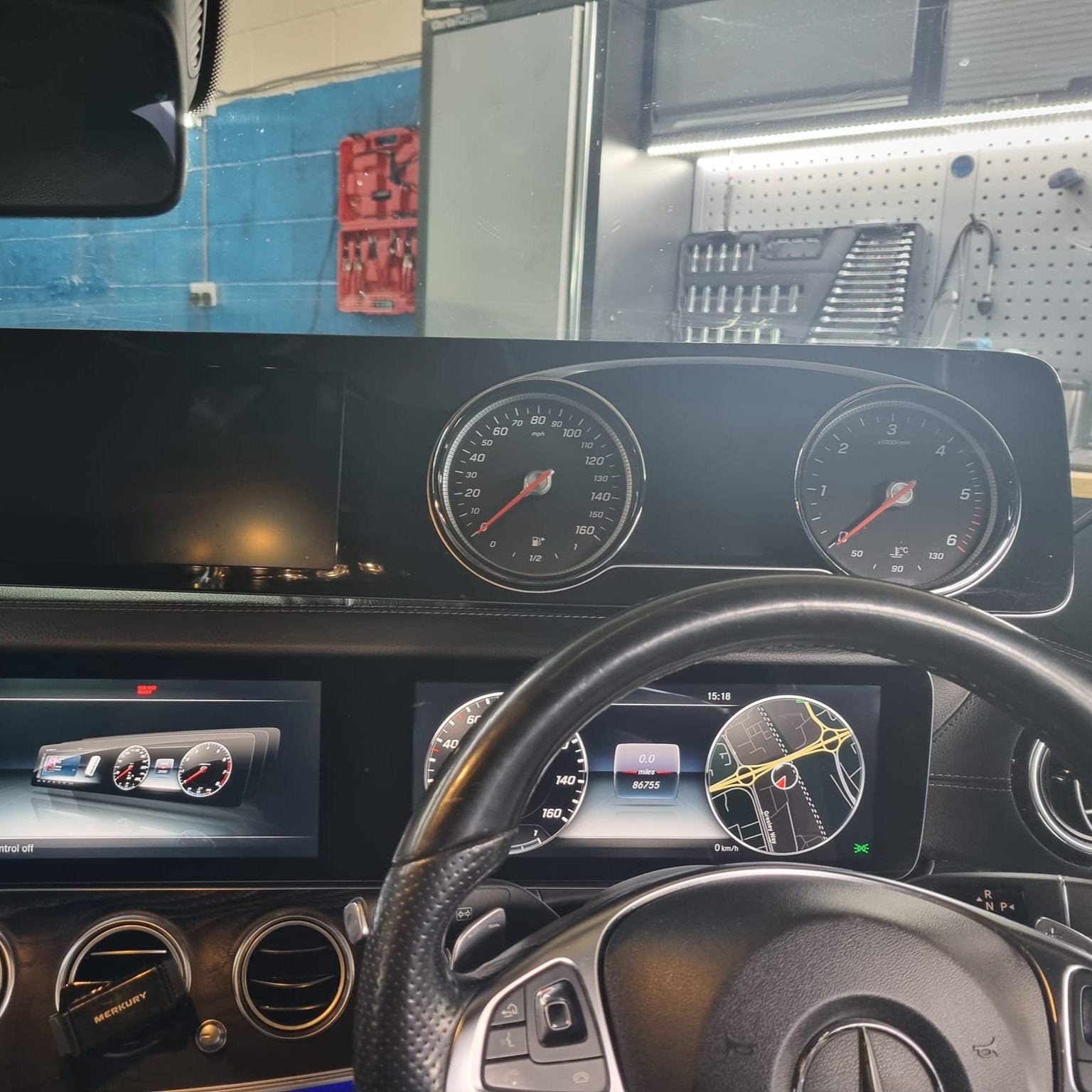 AM Auto Electrician working on a Mercedes diagnostic