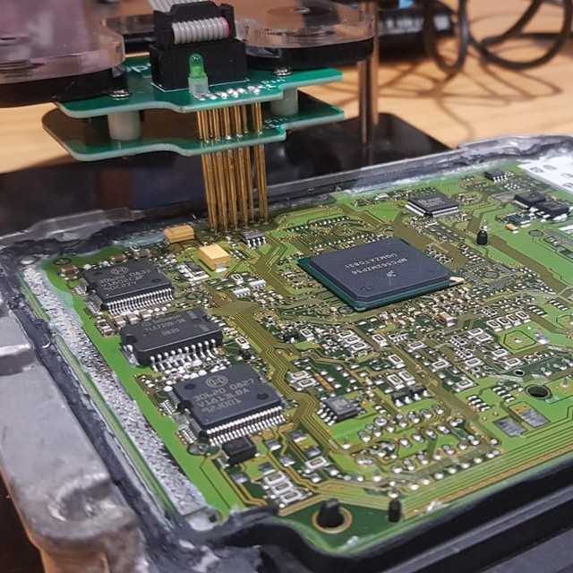 AM Auto Electrician tackling a complex electrical repair