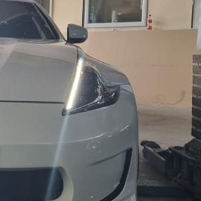 LED headlight retrofit on a workshop bench